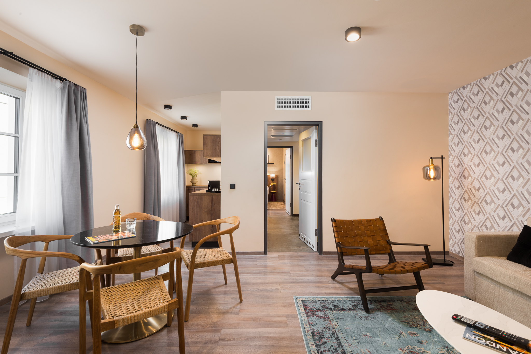 Comfortable living space in a one-bedroom apartment at master Linzergasse, with a sleek design and inviting ambiance.