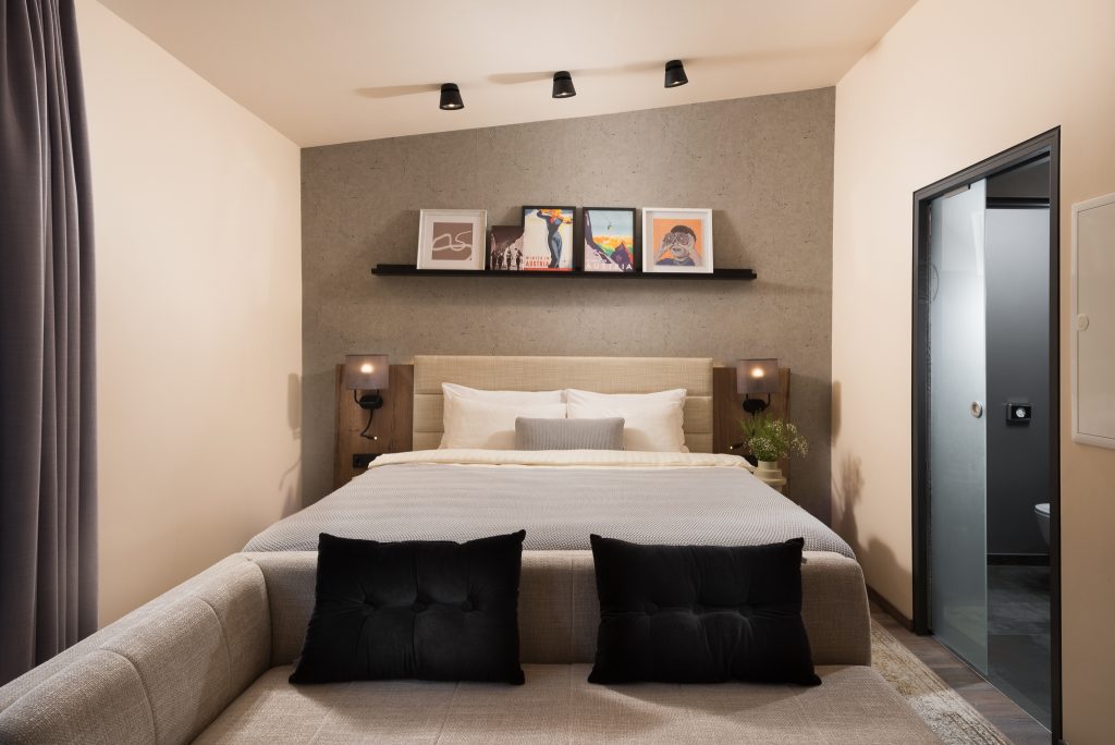 Elegant and comfortable bedroom at master Linzergasse, designed for a restful stay with soft lighting