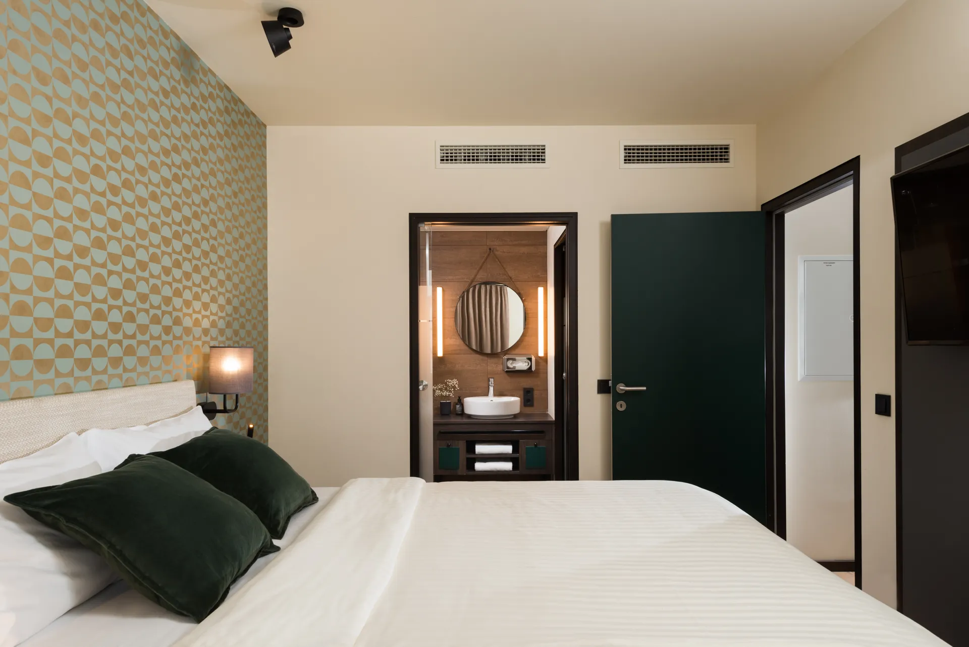 Cozy and well-appointed bed at master Mirabell, designed for relaxation.