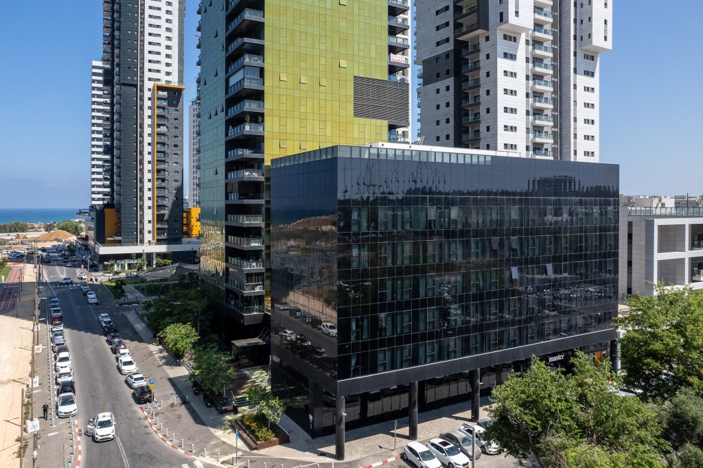 Modern exterior of master Bat Yam, showcasing sleek architecture and contemporary design in a prime urban location.