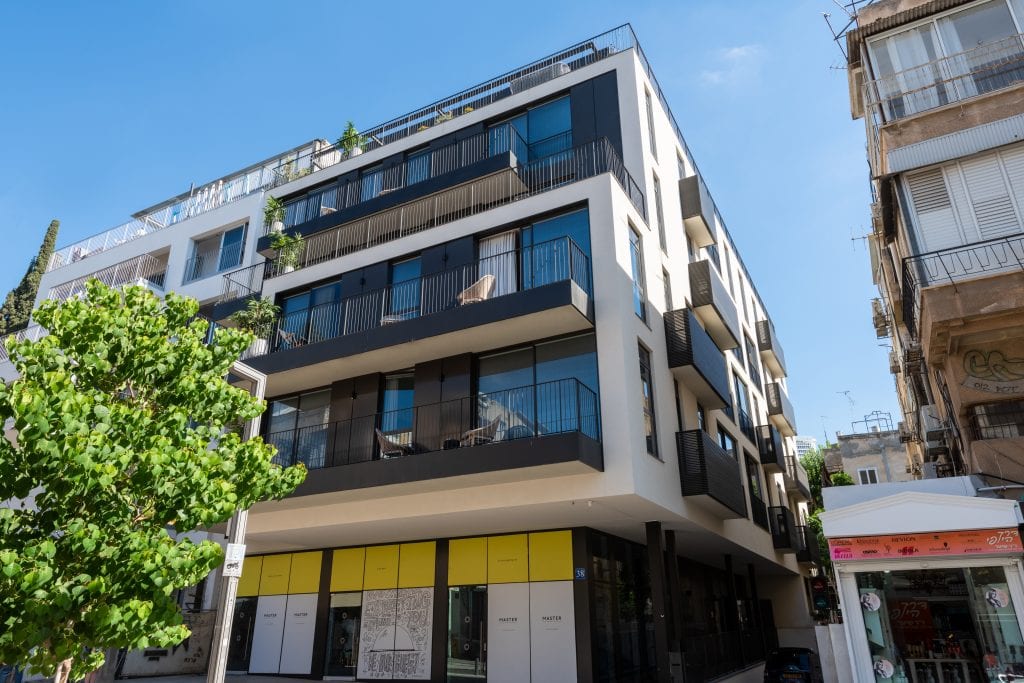 Modern exterior of master Shenkin Tel Aviv, showcasing sleek architecture in the heart of the city