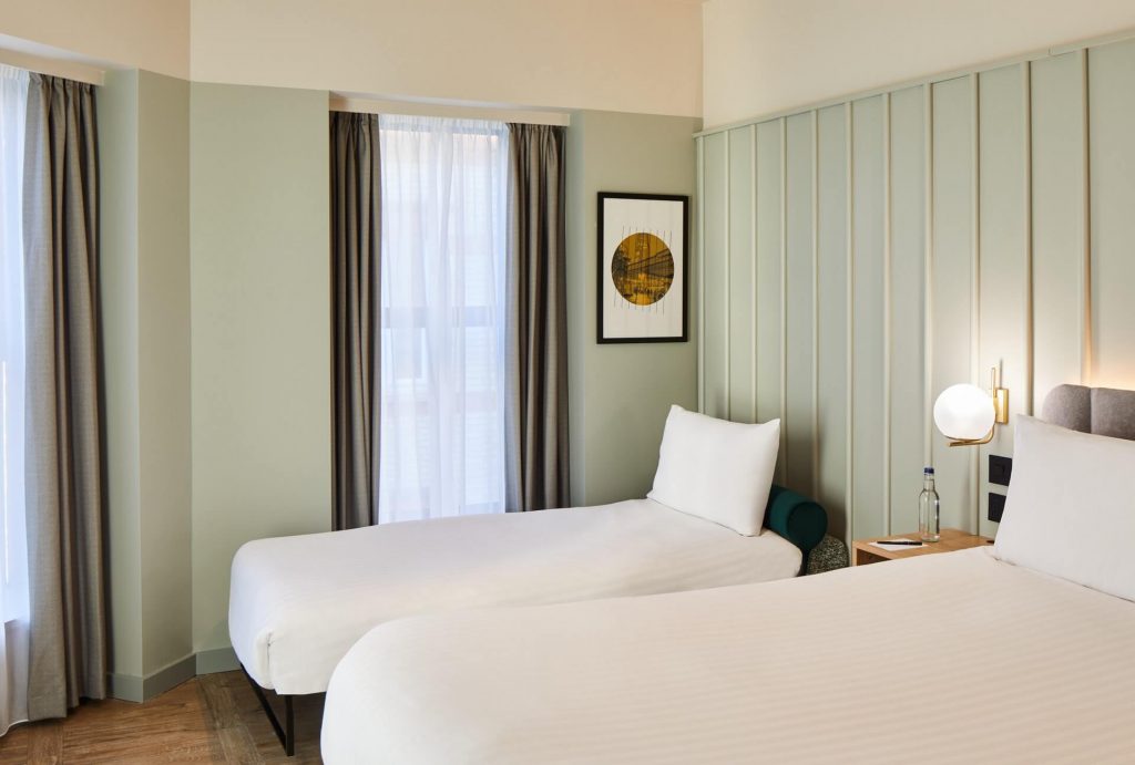 Well-appointed Studio with Sofa Bed at master St. Paul’s London, offering a plush bed and an open, airy living space.