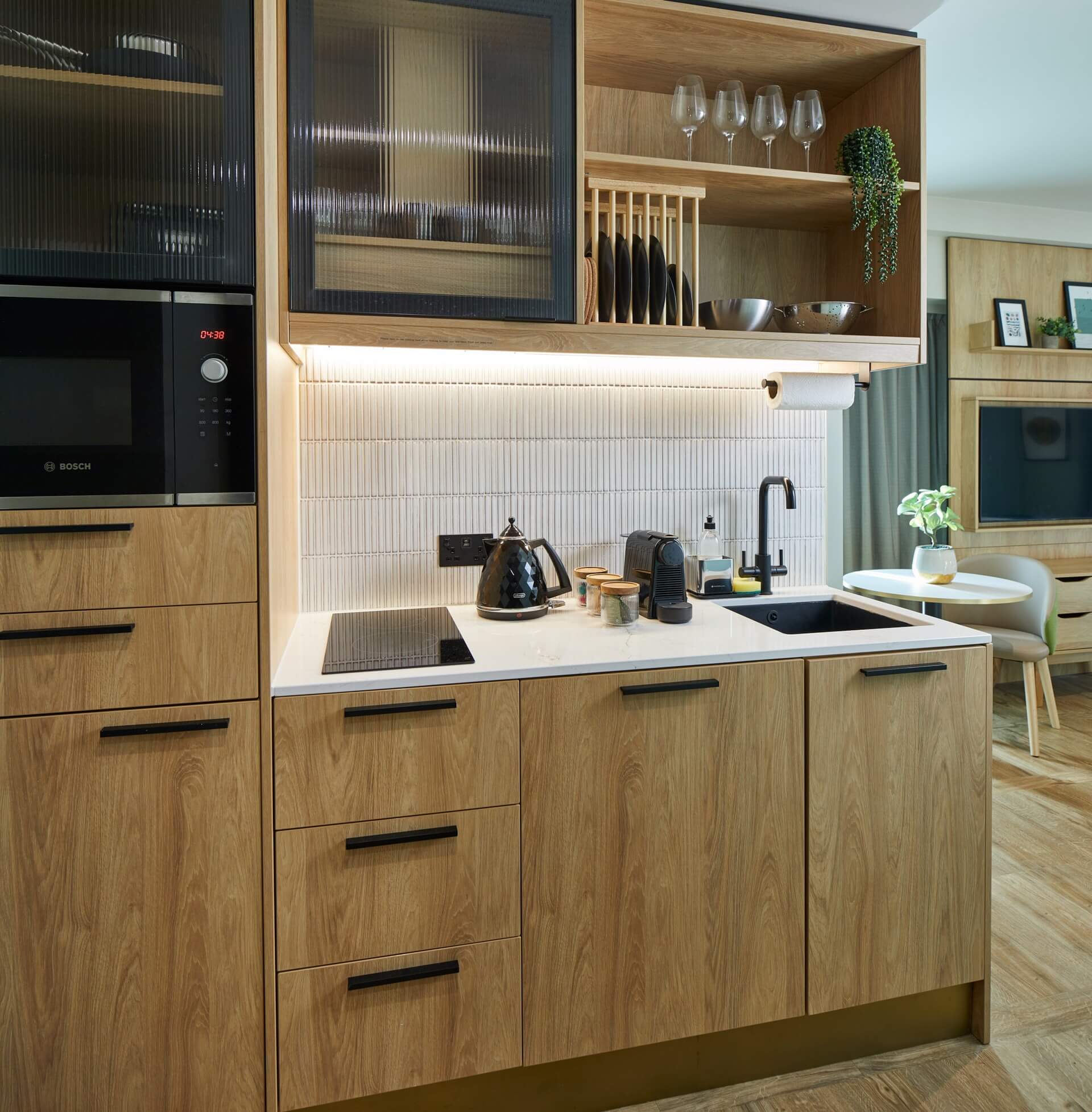 Fully equipped kitchenette in the Studio with Sofa Bed at master St. Paul’s London, designed with modern appliances and a functional layout.