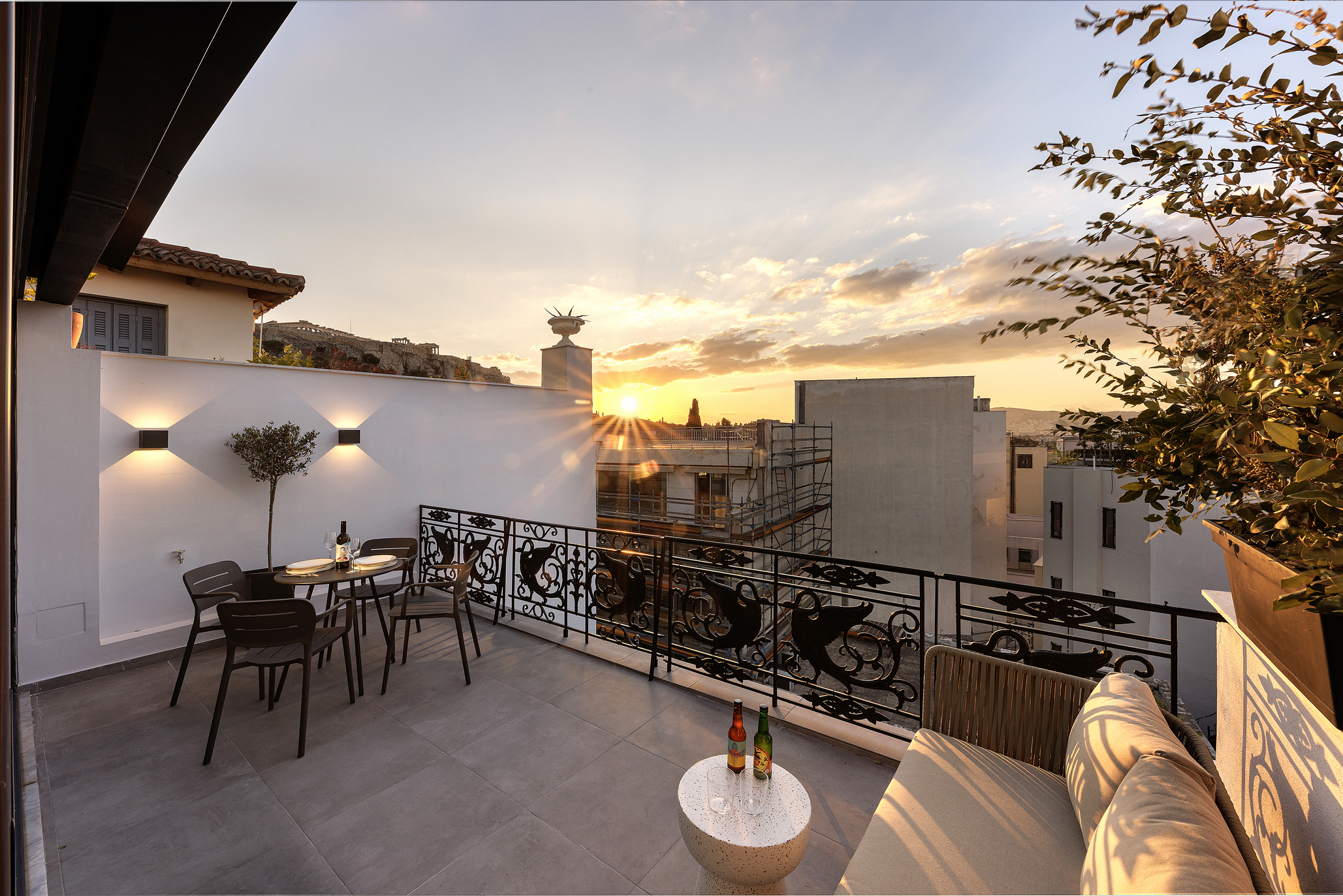 Private balcony in the One Bedroom Penthouse at master Plaka Athens, offering breathtaking views of the Acropolis.