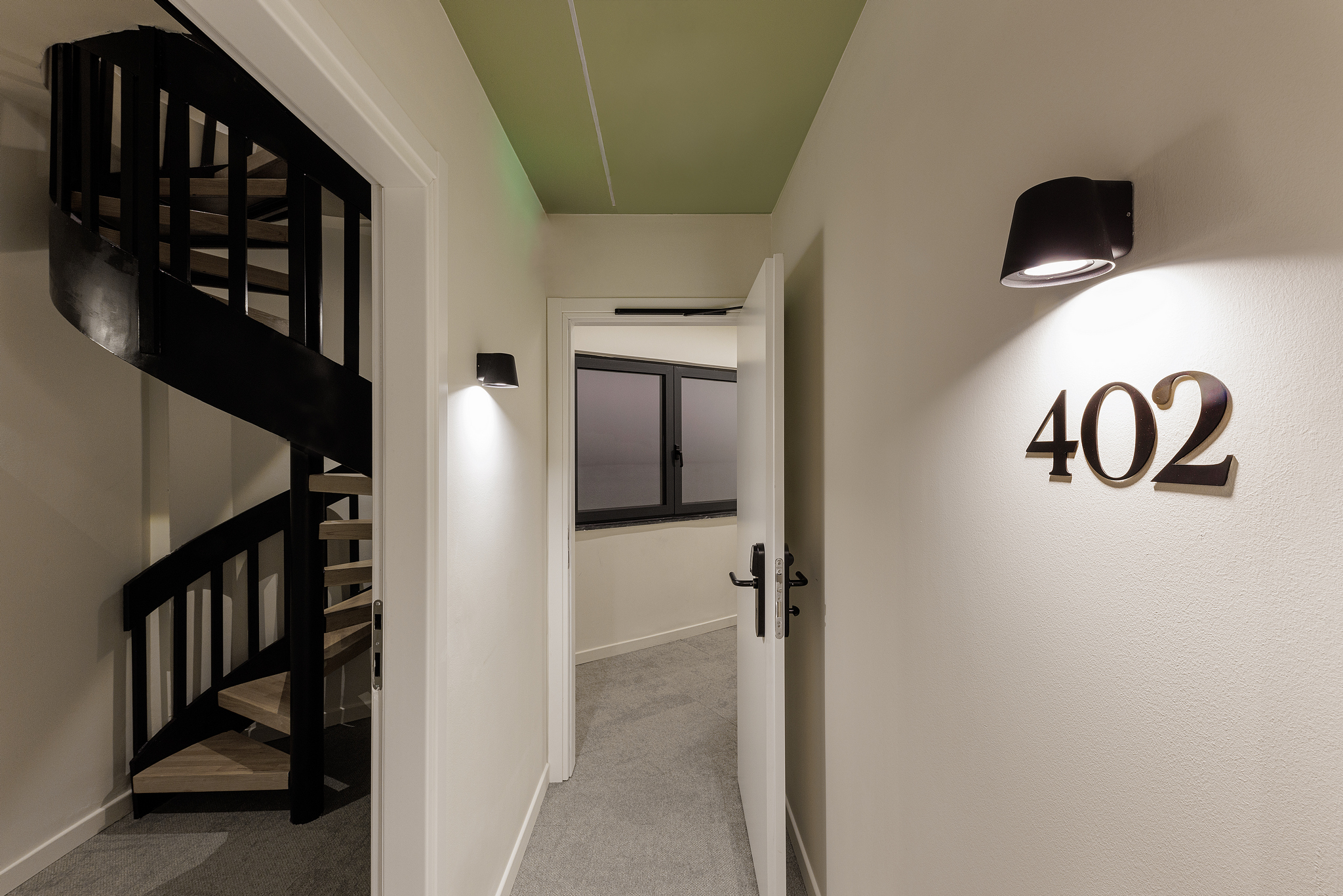 Entrance to the Family Room at master Plaka Athens, featuring a sleek door with the room number clearly displayed
