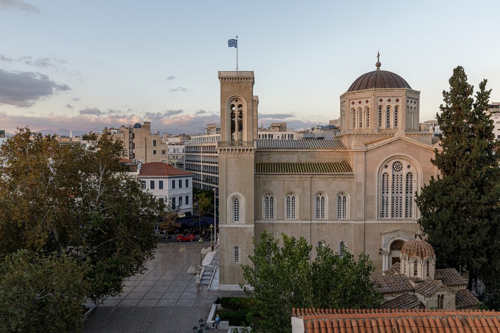 Elegant historical building near master Plaka Athens, showcasing classic Athenian architecture and timeless charm.