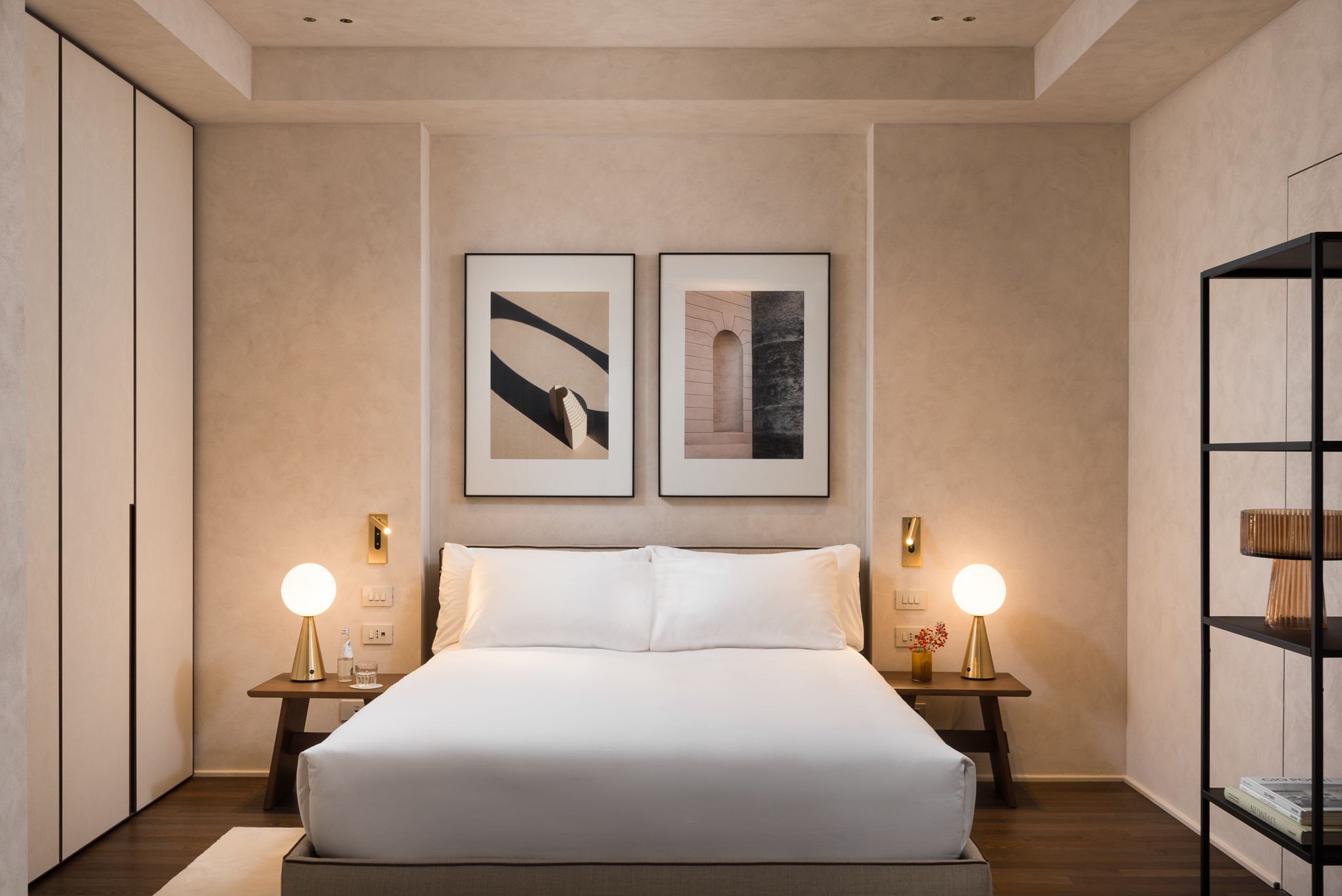 Comfortable bed in the Large Studio Ground Level at master Trevi Rome, set in a well-designed space for a restful and cozy stay.