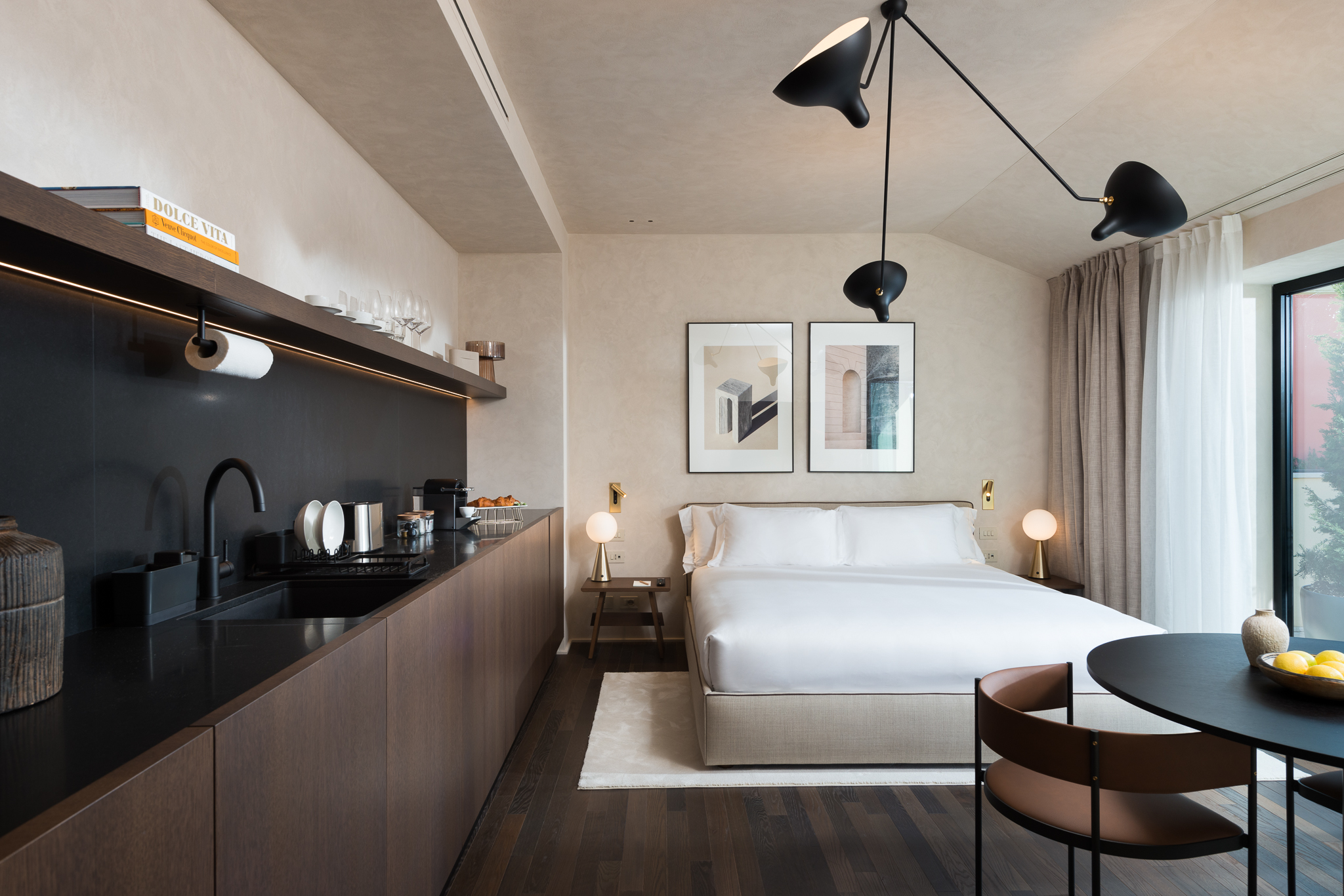 Comfortable and stylish bed in the Three-Bedroom Penthouse at master Trevi Rome, designed for a restful night’s sleep